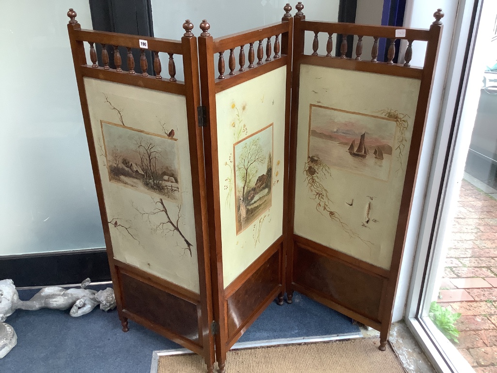 A late Victorian walnut three fold dressing screen with painted canvas panels, each panel width 50cm, height 138cm
